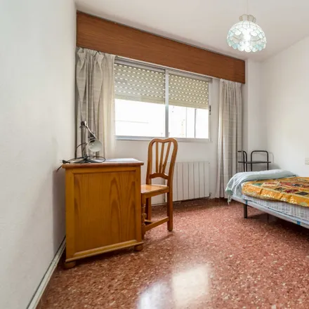 Rent this 3 bed room on Carrer del Arquebisbe Fabián i Fuero in 46009 Valencia, Spain