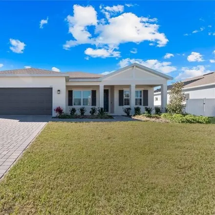 Buy this 4 bed house on Izzy Place in Apopka, FL 32712