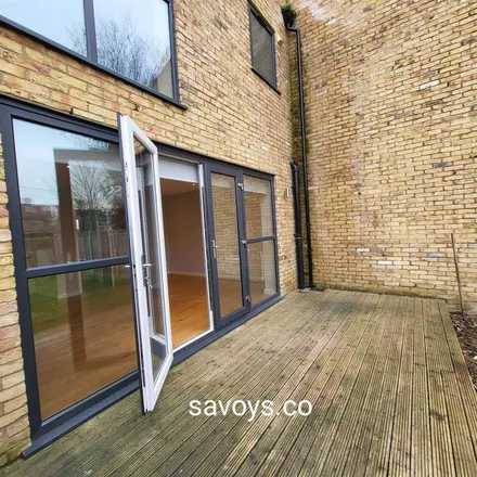 Rent this 3 bed townhouse on Woodstock Crescent in London, N9 7LY