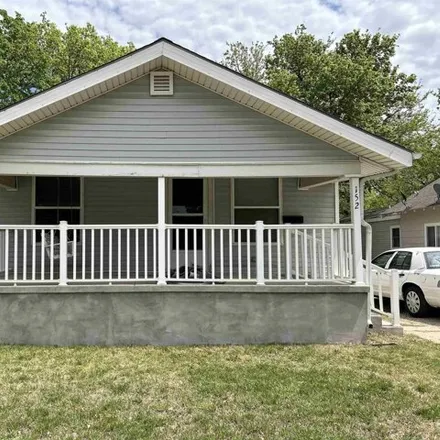 Buy this 2 bed house on 2477 West 1st Street North in Wichita, KS 67203