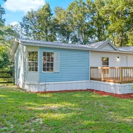 Buy this 4 bed house on 6997 Red Gum Court in Leon County, FL 32303
