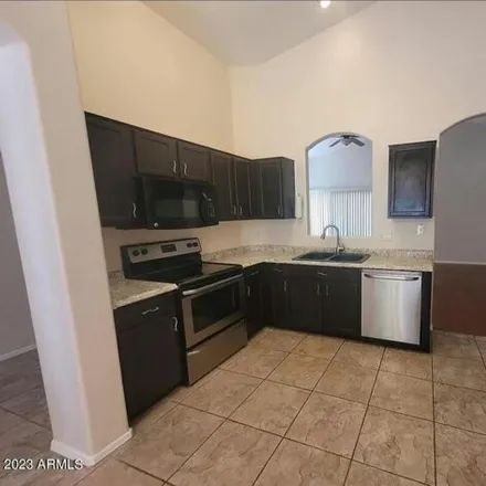 Rent this 3 bed house on 13177 West Evans Drive in Surprise, AZ 85379