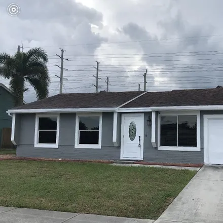 Rent this 3 bed house on 1068 Grandview Circle in Royal Palm Beach, Palm Beach County