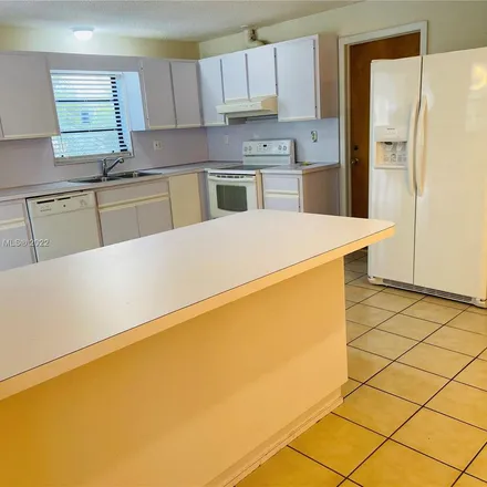 Rent this 3 bed apartment on 4380 Southwest 89th Avenue in Pioneer Park, Miami-Dade County