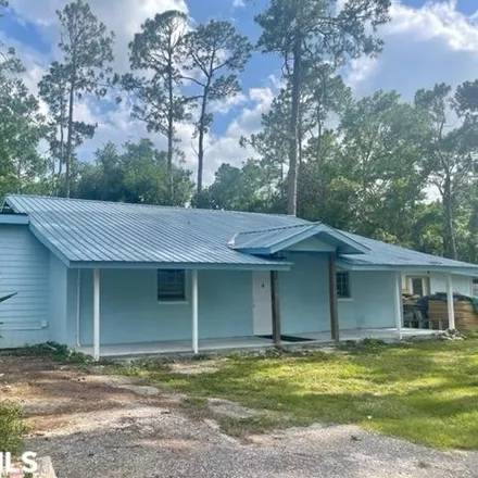 Buy this 4 bed house on 1009 East 24th Avenue in Gulf Shores, AL 36542