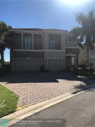 Buy this 5 bed house on 4501 San Mellina Drive in Coconut Creek, FL 33073