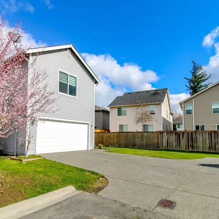 Rent this 4 bed apartment on 12826 Southeast 225th Court in Kent, WA 98031