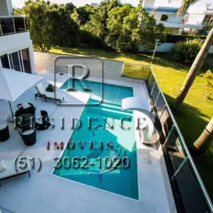 Buy this 4 bed house on Passagem dos Delfins in Jurerê Internacional, Florianópolis - SC