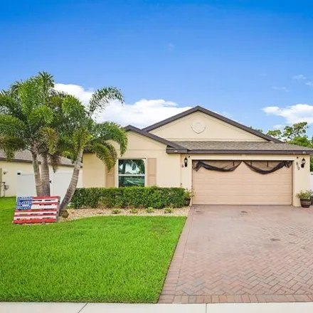 Buy this 4 bed house on 910 Bent Creek Dr in Fort Pierce, Florida