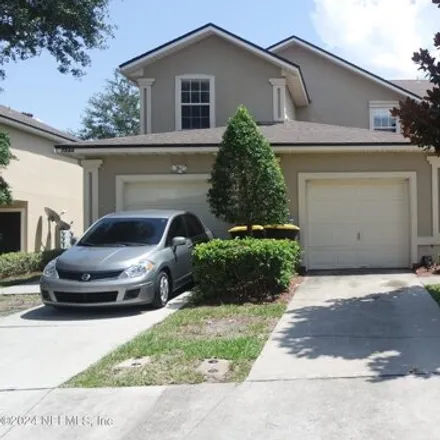 Rent this 2 bed house on 7824 Playpen Court in North Oak Hill, Jacksonville