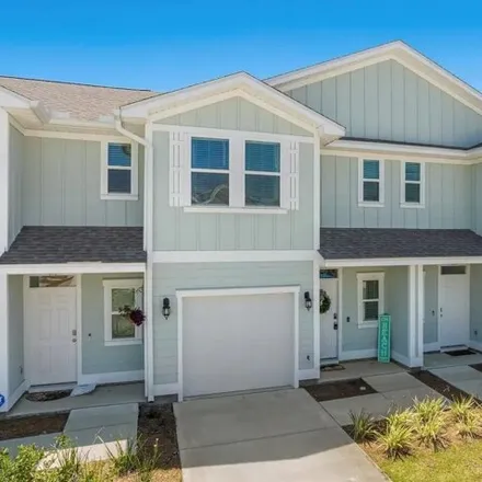 Buy this 3 bed townhouse on Shadow Lake Drive in Bay County, FL 32408