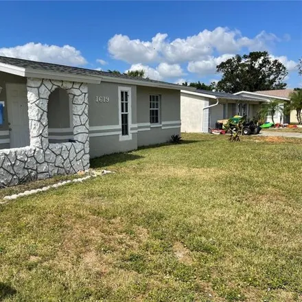 Buy this 3 bed house on 1627 Scotten Street in Port Charlotte, FL 33952
