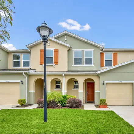 Rent this 4 bed townhouse on 5130 Adelaide Drive in Osceola County, FL 34746