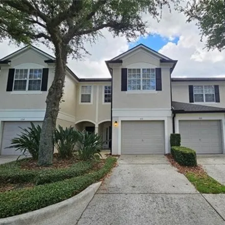 Rent this 3 bed townhouse on 6242 Twain Street in MetroWest, Orlando