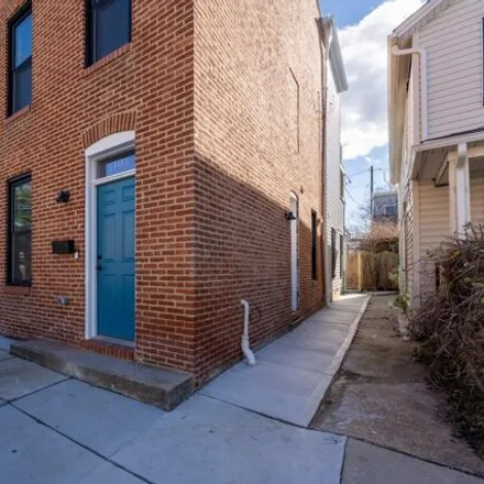 Rent this 4 bed house on 1403 West 36th Street in Baltimore, MD 21211