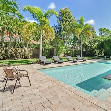 Rent this 3 bed house on 625 Orchid Drive in Naples, FL 34102