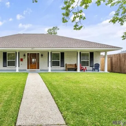 Buy this 4 bed house on 10417 Classique Drive in Harelson, Baton Rouge