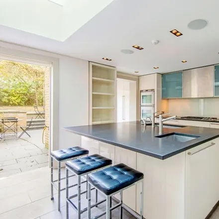 Rent this 5 bed townhouse on 75 in 73 South Hill Park Gardens, London