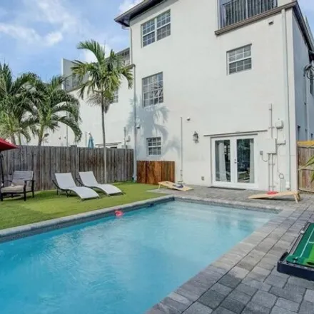 Rent this 4 bed townhouse on 121 Northwest 8th Street in Fort Lauderdale, FL 33311