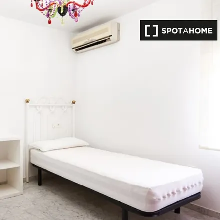 Rent this 3 bed room on Asoc. Cult. Bética Triana Verde in Calle Garcilaso de la Vega, 41080 Seville