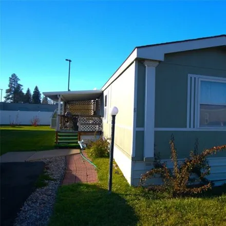 Buy this studio apartment on 112 East Evergreen Drive in Evergreen, MT 59901