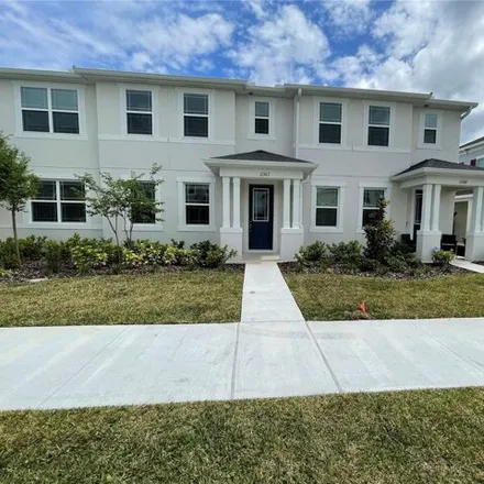 Rent this 3 bed townhouse on Arbor Glen Court in Orange County, FL 32832