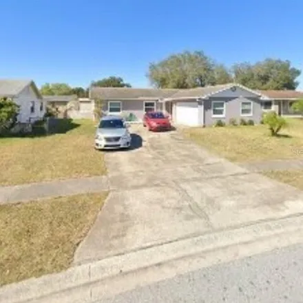 Rent this 4 bed house on 7637 Ceres Drive in Orange County, FL 32822