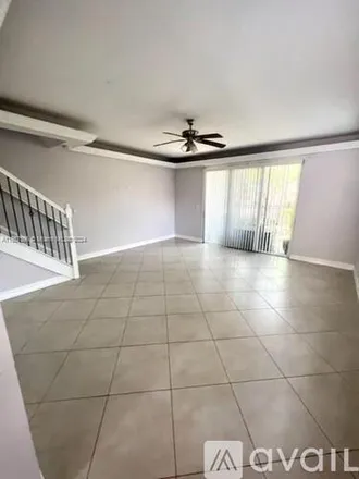 Rent this 2 bed townhouse on 1145 SW 1st St
