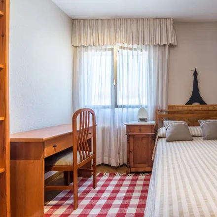 Rent this 4 bed room on Calle de la Calandria in 28023 Madrid, Spain