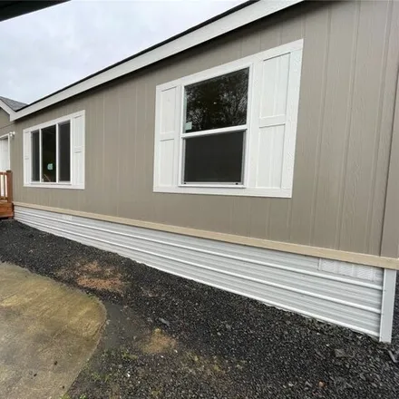 Buy this studio apartment on 1074 Howard Street in Raymond, WA 98577