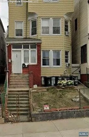 Buy this 7 bed house on 125 Park Avenue in Newark, NJ 07104