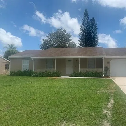 Rent this 3 bed house on 3277 Southwest Ronlea Court in Port Saint Lucie, FL 34953