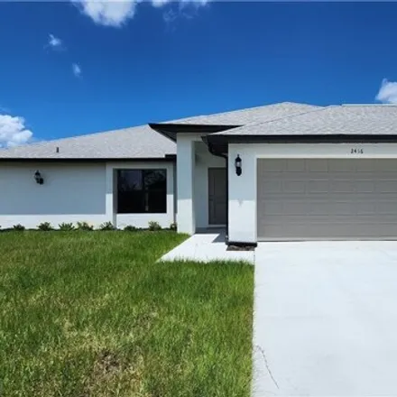 Buy this 4 bed house on 2502 Northwest 15th Place in Cape Coral, FL 33993