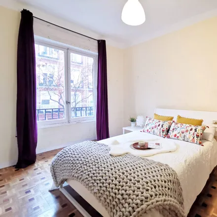 Rent this 8 bed room on Madrid in Arapiles, Calle de Fernández de los Ríos
