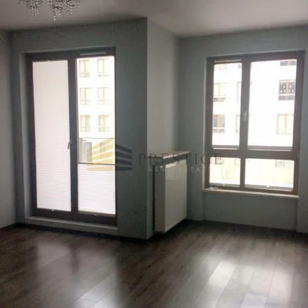 Rent this 3 bed apartment on Obrzeżna 1C in 02-691 Warsaw, Poland