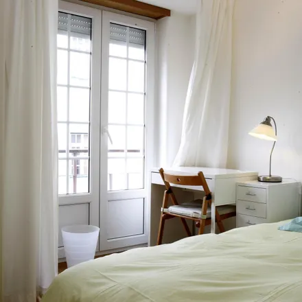 Rent this 5 bed room on Rua José Acúrcio das Neves 11 in 1900-999 Lisbon, Portugal