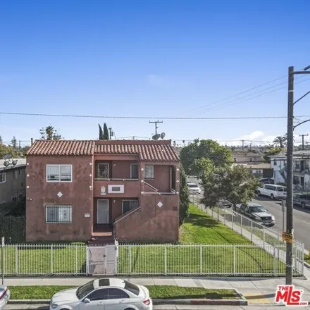 Buy this 16 bed house on 8810 South Budlong Avenue in Los Angeles, CA 90044