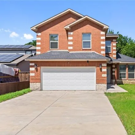 Buy this 3 bed house on 657 Southwest 15th Street in Grand Prairie, TX 75051