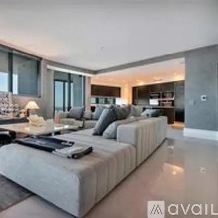 Rent this 3 bed condo on 18555 Collins Ave