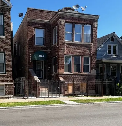 Buy this 6 bed house on 4952 W Augusta Blvd in Chicago, Illinois