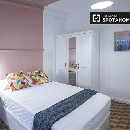 Rent this 8 bed room on Carrer d'Entença in 46003 Valencia, Spain