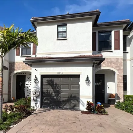 Rent this 3 bed townhouse on West 111th Street in Hialeah, FL 33018