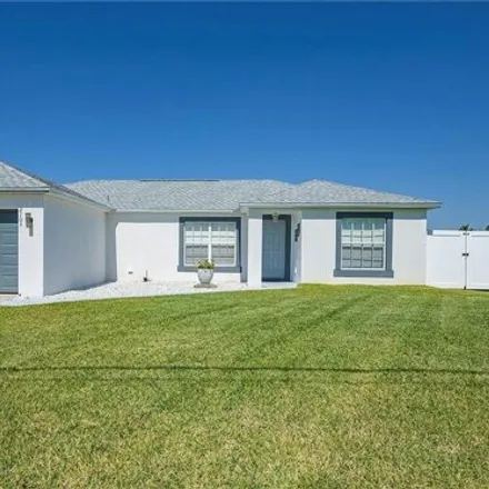 Buy this 3 bed house on 2103 Northeast 15th Street in Cape Coral, FL 33909