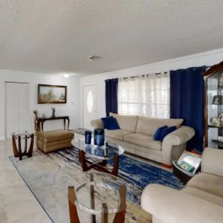 Buy this 4 bed apartment on 12126 Northwest 33Rd Street in Westchester, Coral Springs