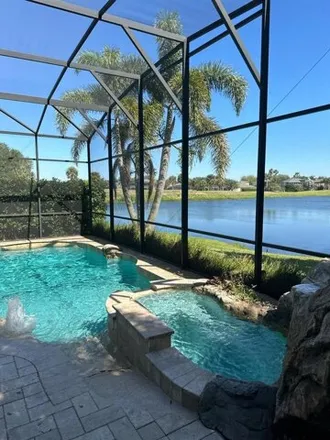 Rent this 4 bed house on 15570 Amberbeam Boulevard in Winter Garden, FL 34787