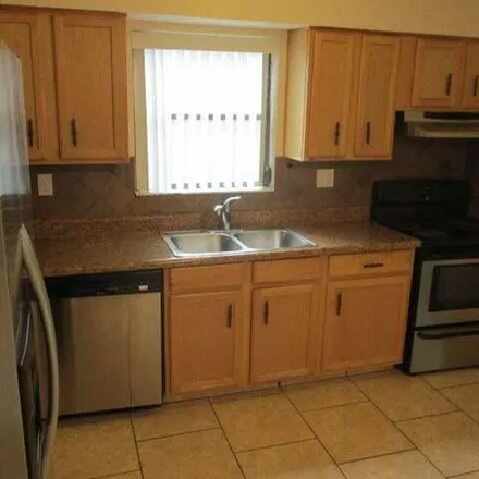 Image 1 - 9075 East Highland Pines Drive, North Palm Beach, FL 33418, USA - Apartment for rent