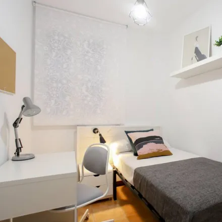 Rent this 6 bed room on Bar Jesus in Carrer d'Àngel Guimerà, 46008 Valencia