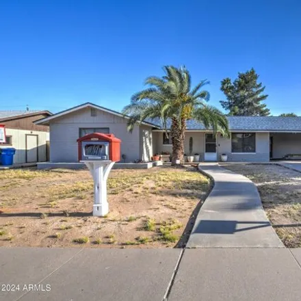 Buy this 4 bed house on 3243 East Captain Dreyfus Avenue in Phoenix, AZ 85032