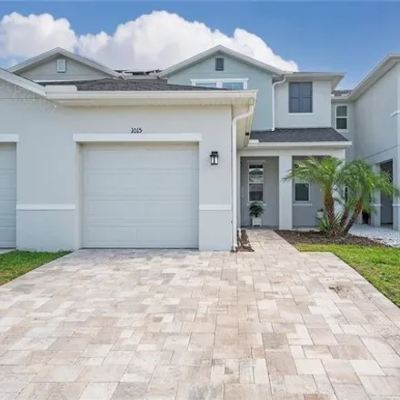 Buy this 4 bed townhouse on 1011 la Miranda Court in Osceola County, FL 34744