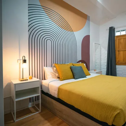 Rent this 4 bed room on Hotel Gaudí in Carrer de les Penedides, 08001 Barcelona